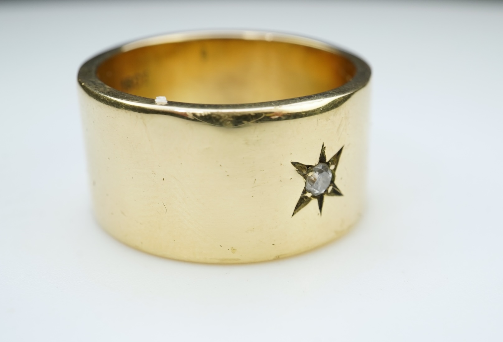 A gold and diamond ring